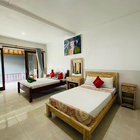 אמד Coconut Beach Bungalows & Warung 2 מראה חיצוני תמונה