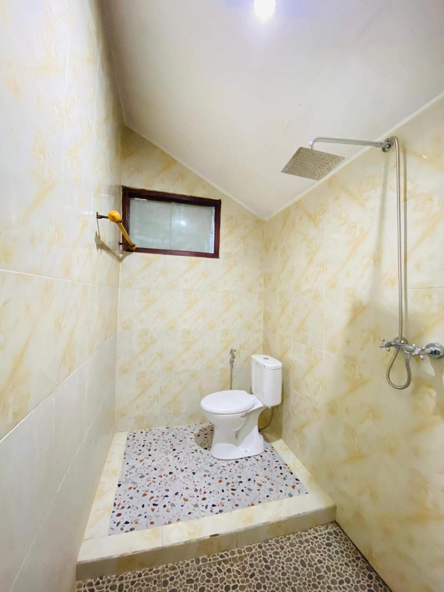 אמד Coconut Beach Bungalows & Warung 2 מראה חיצוני תמונה