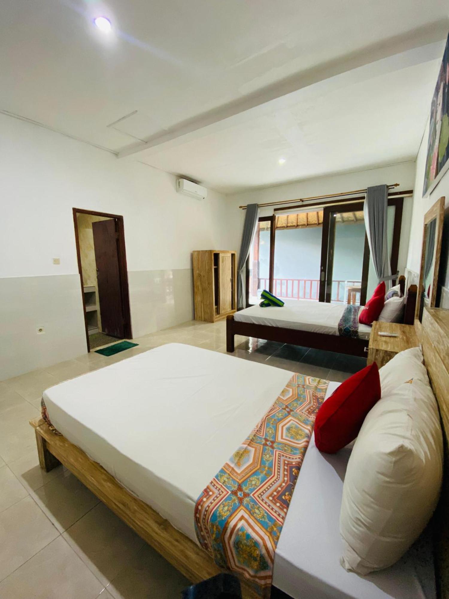 אמד Coconut Beach Bungalows & Warung 2 מראה חיצוני תמונה
